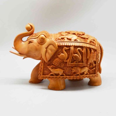 Whitewood Elephant With Miniature Carving 